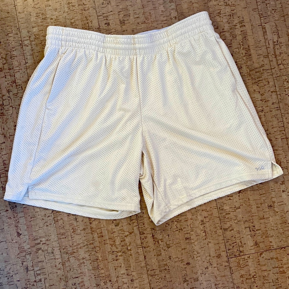 Women’s Athletic shorts in pale yellow, size large, like new condition